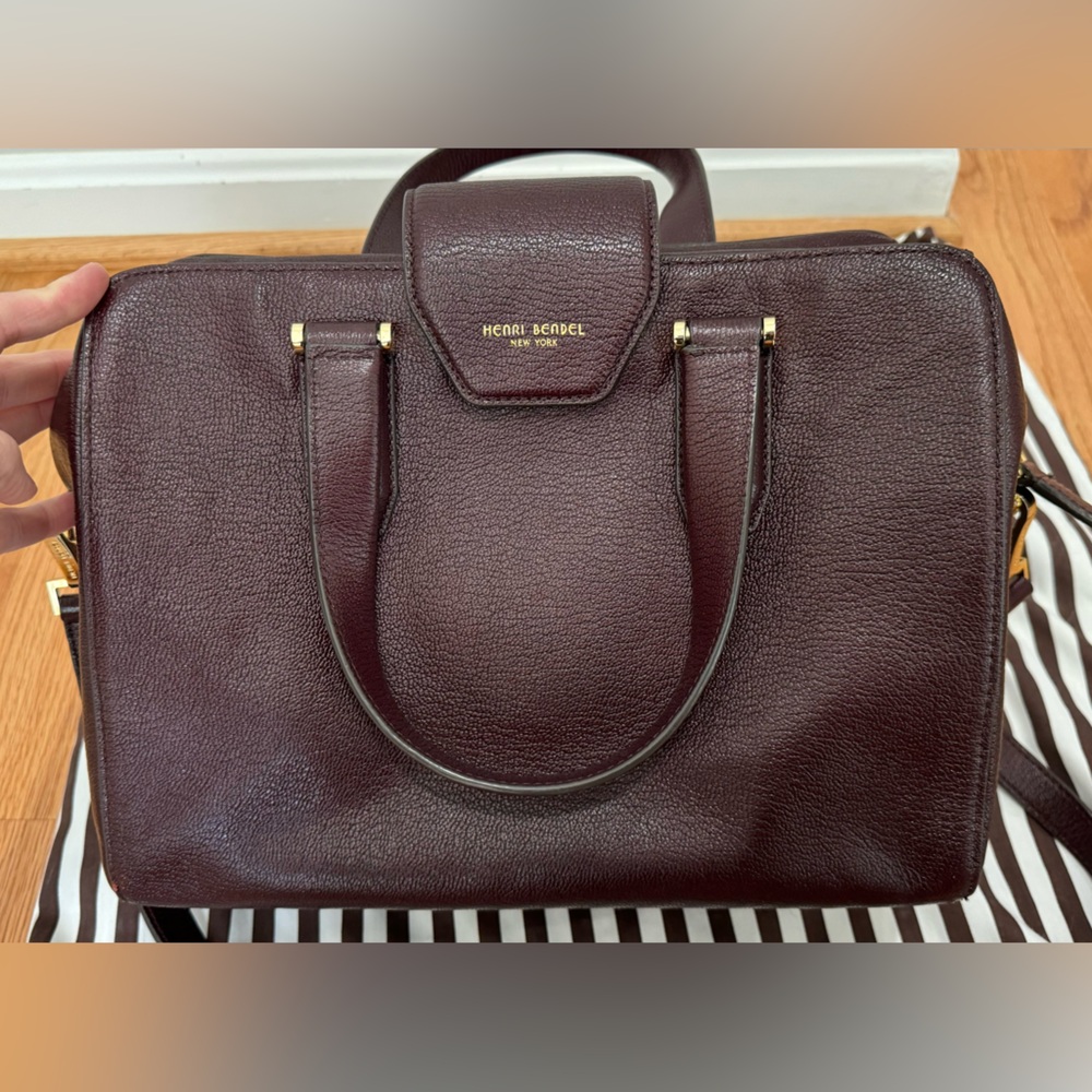 Henri BENDEL Marroon satchel with adjustable shoulder strap.